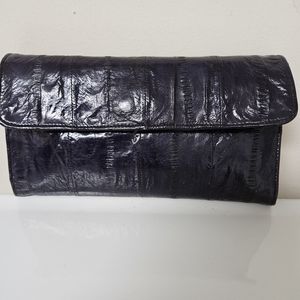 Navy eelskin wallet with checkbook cover.